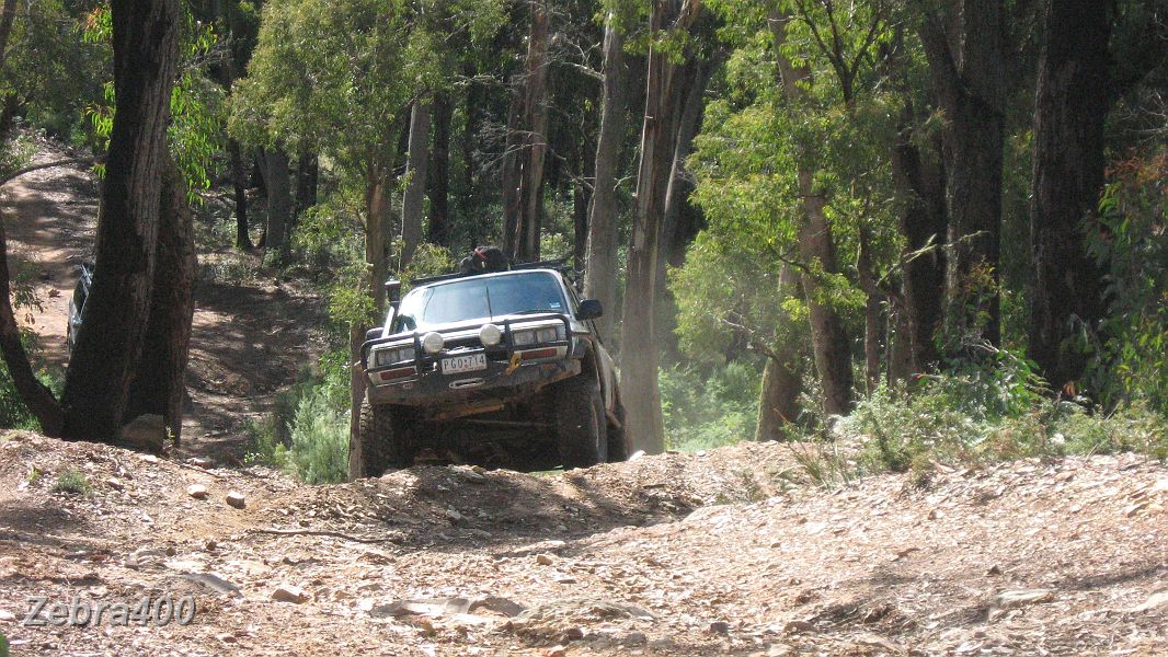 27-Grub climbs Flats Track with front & rear diffs locked.JPG